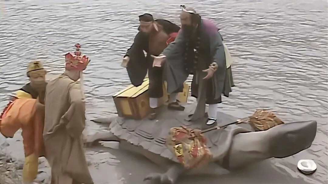 A picture of a Yuan resting in the water or on the bank
